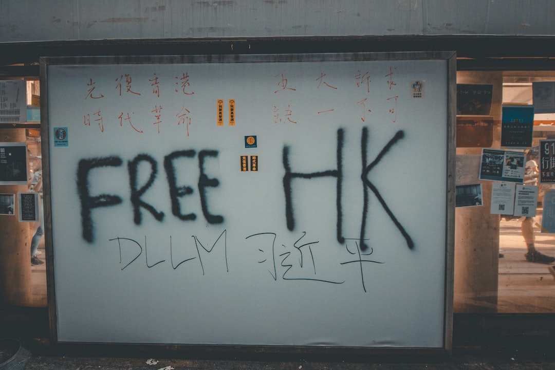 free HK vandal written on white wall