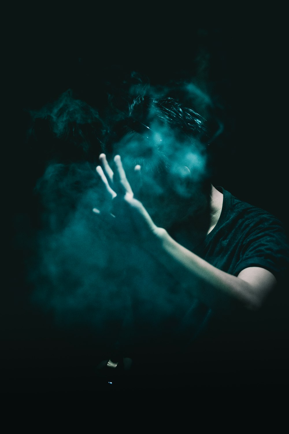person breathing smoke