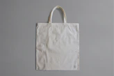 white reusable bag on gray surface
