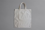 white reusable bag on gray surface
