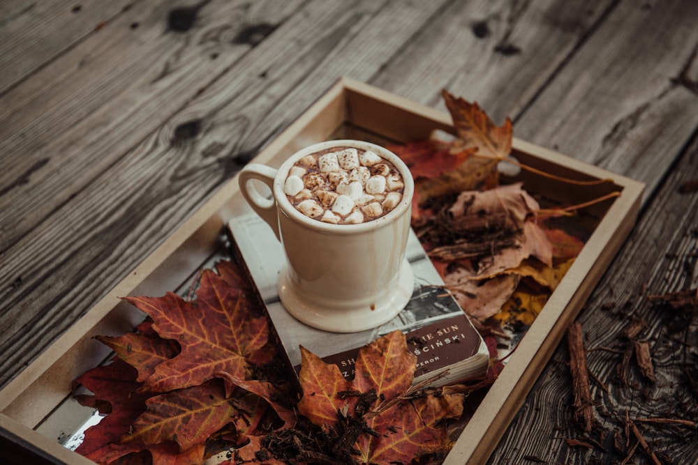 beige mug on gray tray