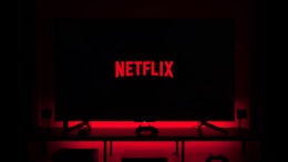 flat screen television displaying Netflix logo