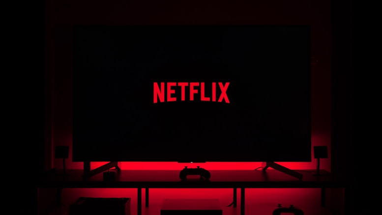 flat screen television displaying Netflix logo