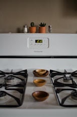 white Frigidaire gas range oven at 2.12