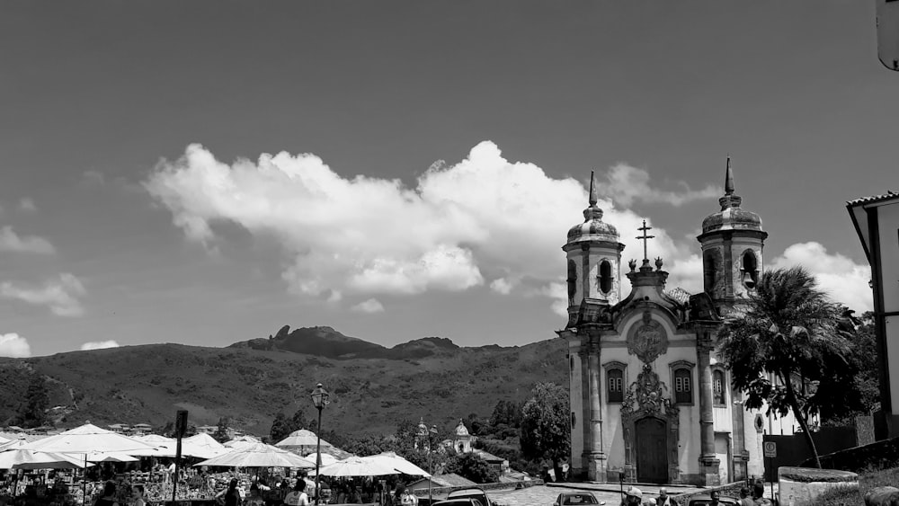 concrete church under cloudy sky