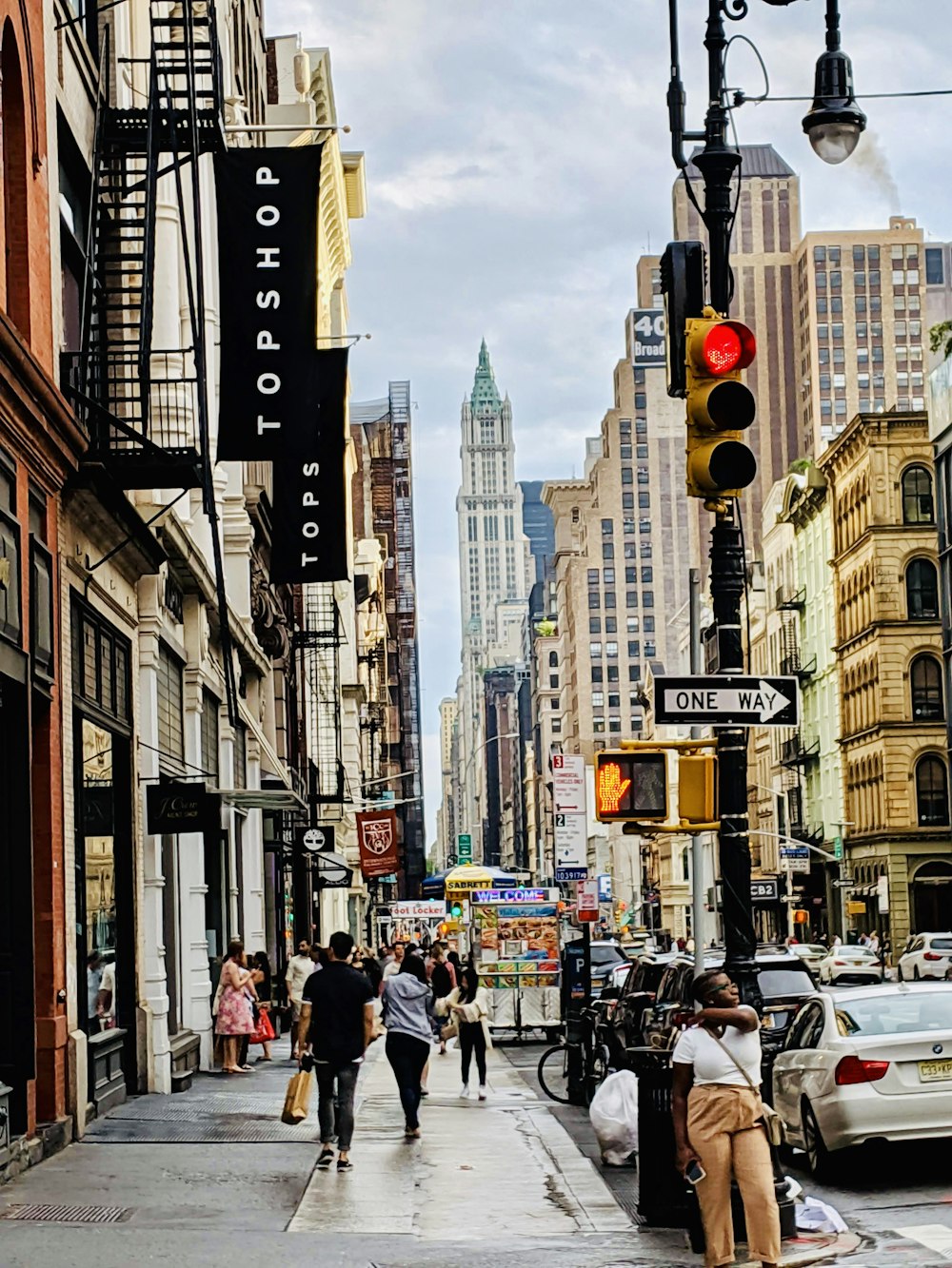 people walking at sidewalk during daytime