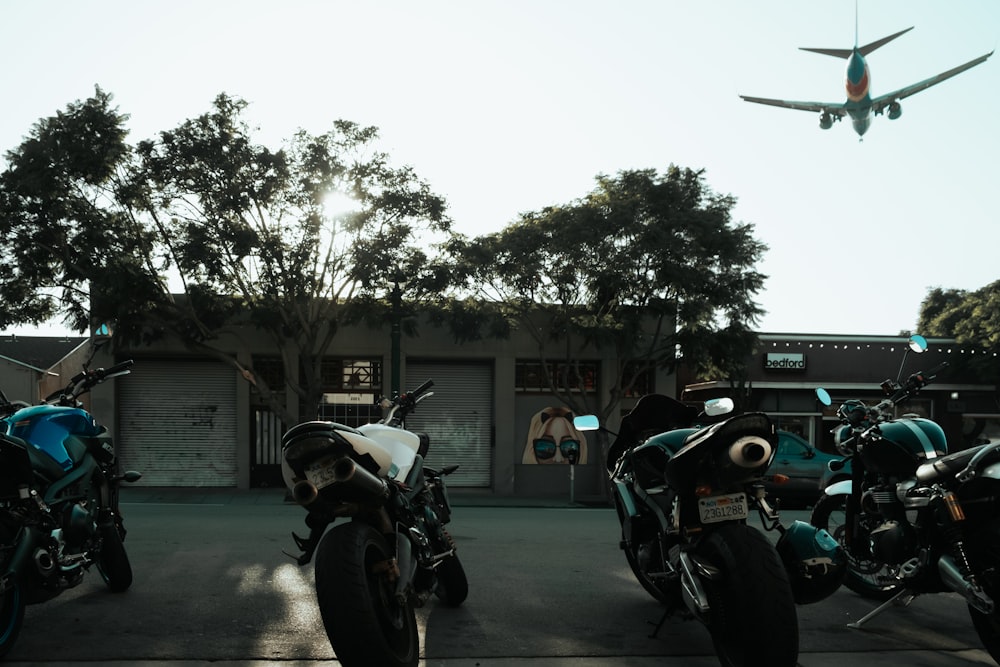 motorcycles parked on concrete pavement