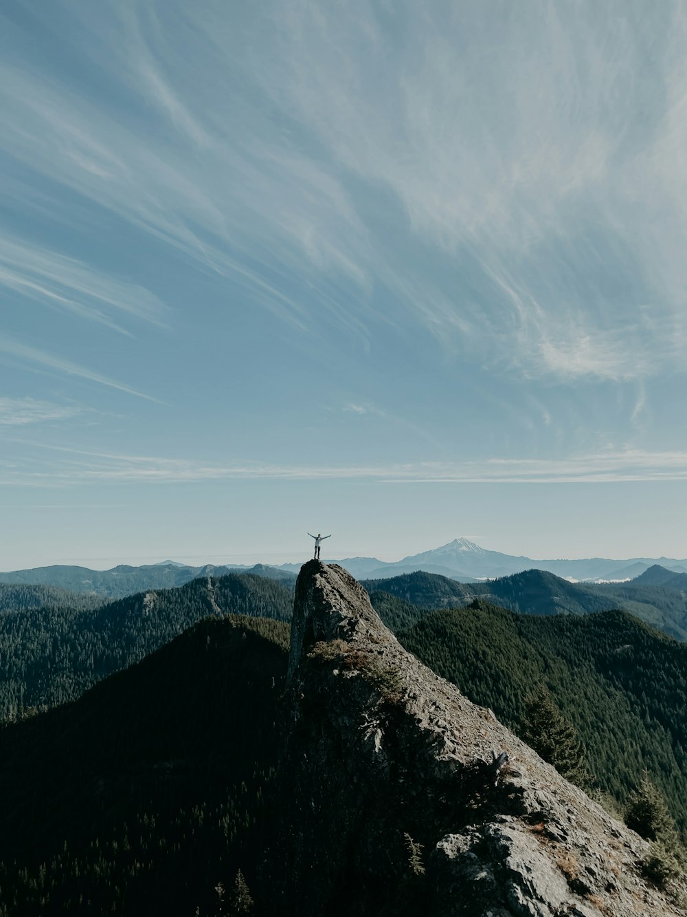 mountains under cloudy sky during daytime