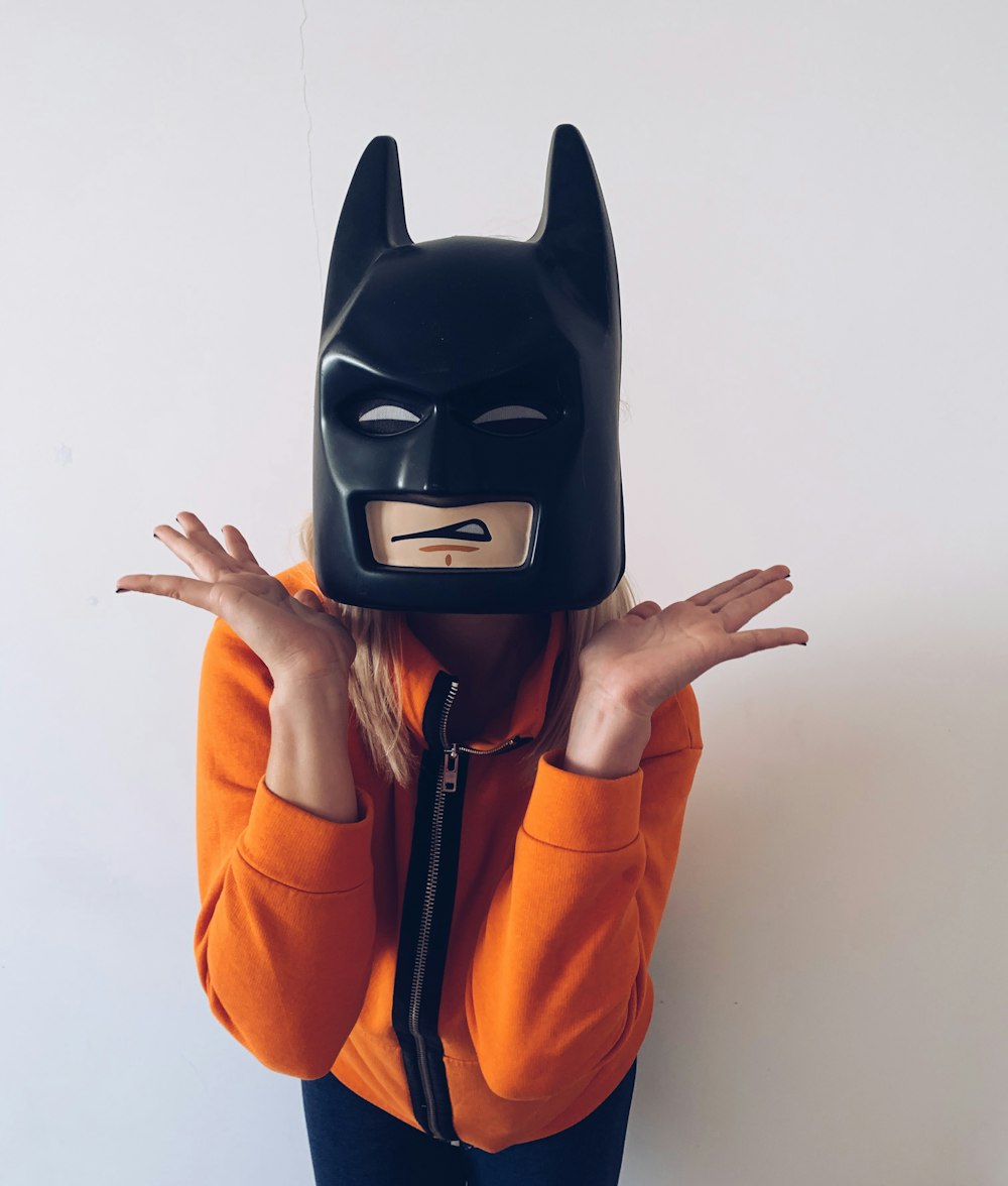 woman wearing batman mask