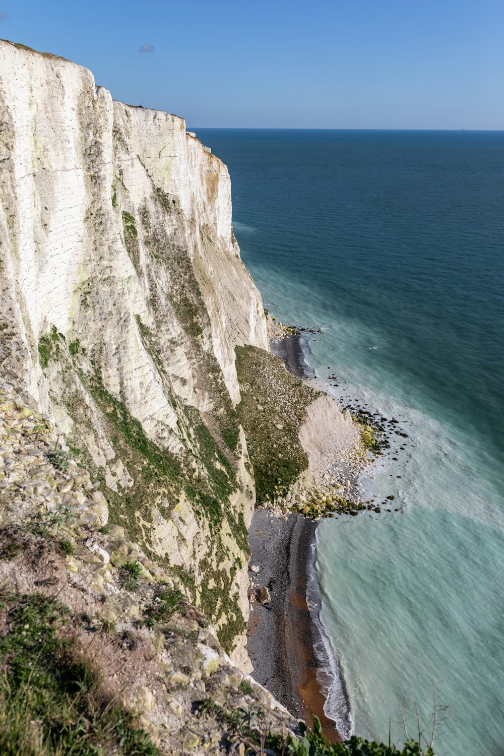 gray sea cliff during daytime