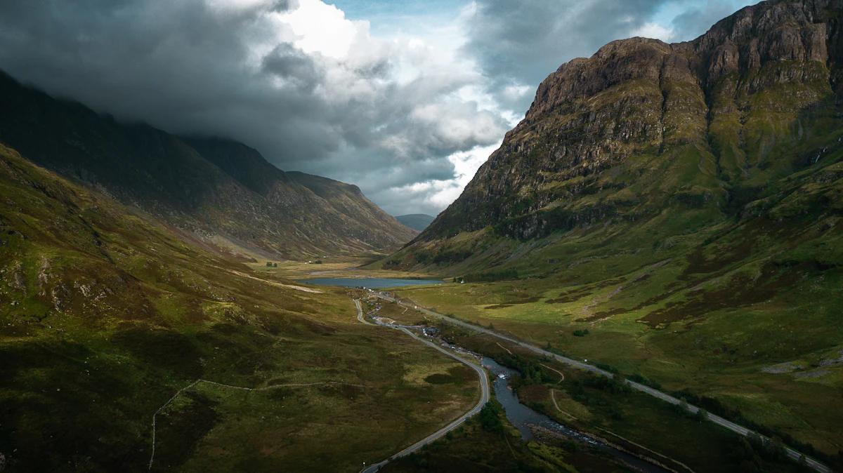Two roads alongside a river through Glencoe, Scotland