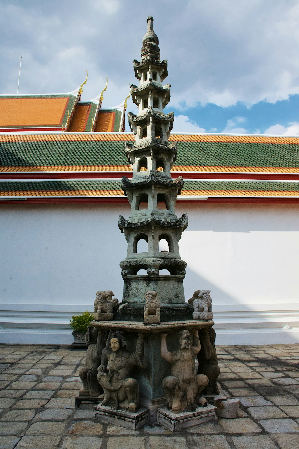 grey pagoda temple statuette