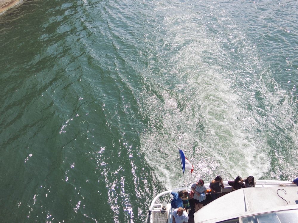 people sitting on boat