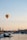 hot air baloon over town