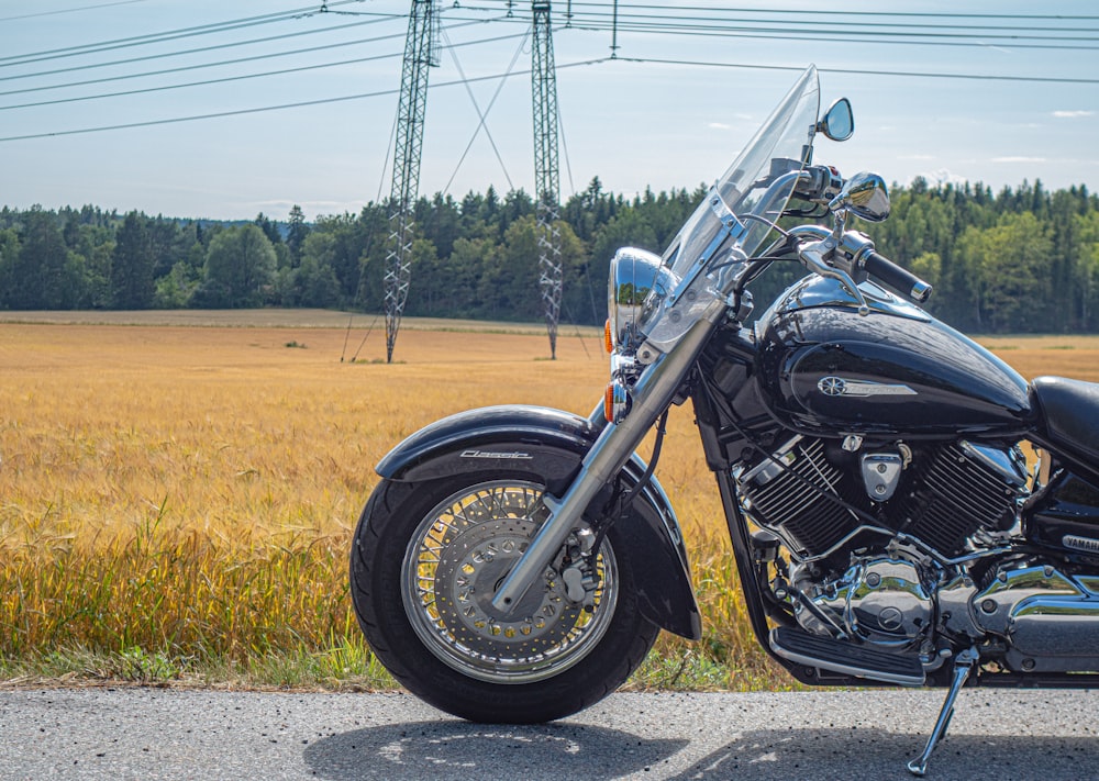 black touring motorcycle during daytime