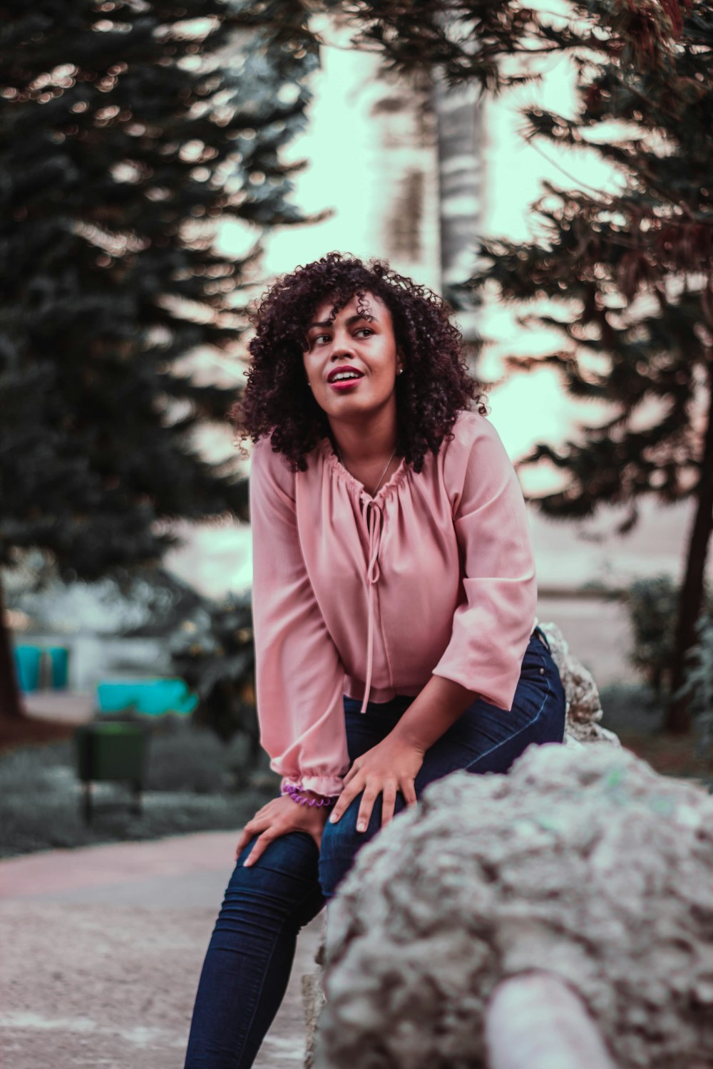 woman wearing pink long-sleeved shirt during daytime