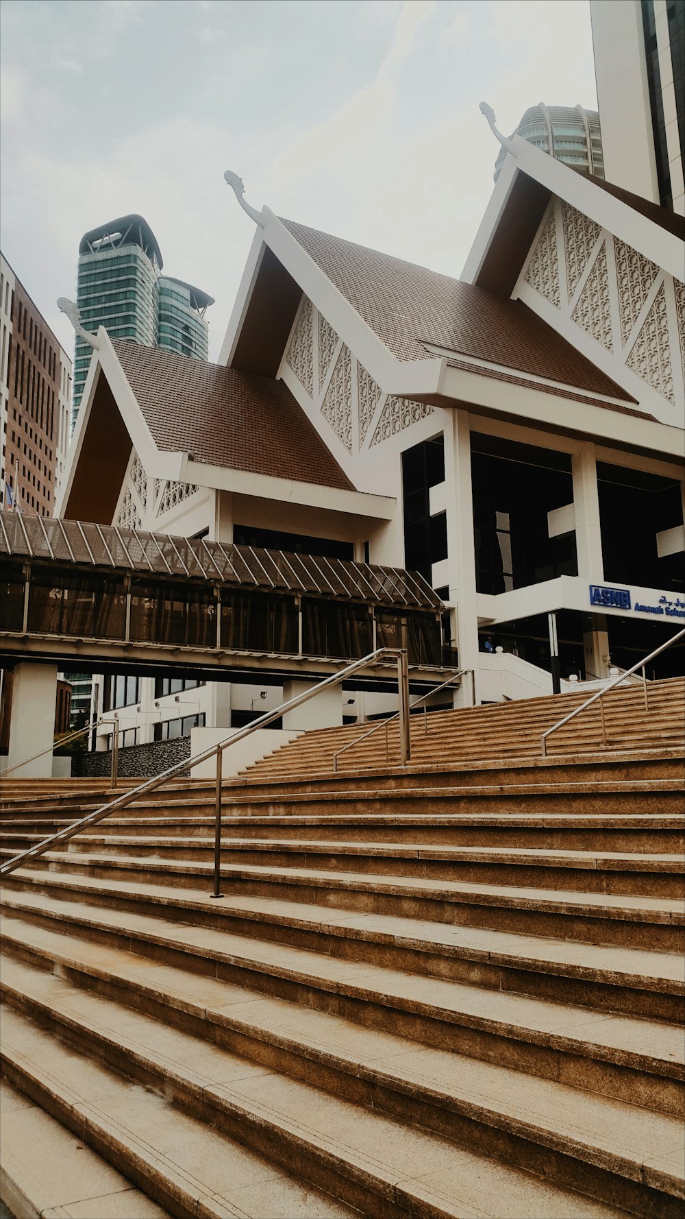 close-up photography of white and brown building during daytime