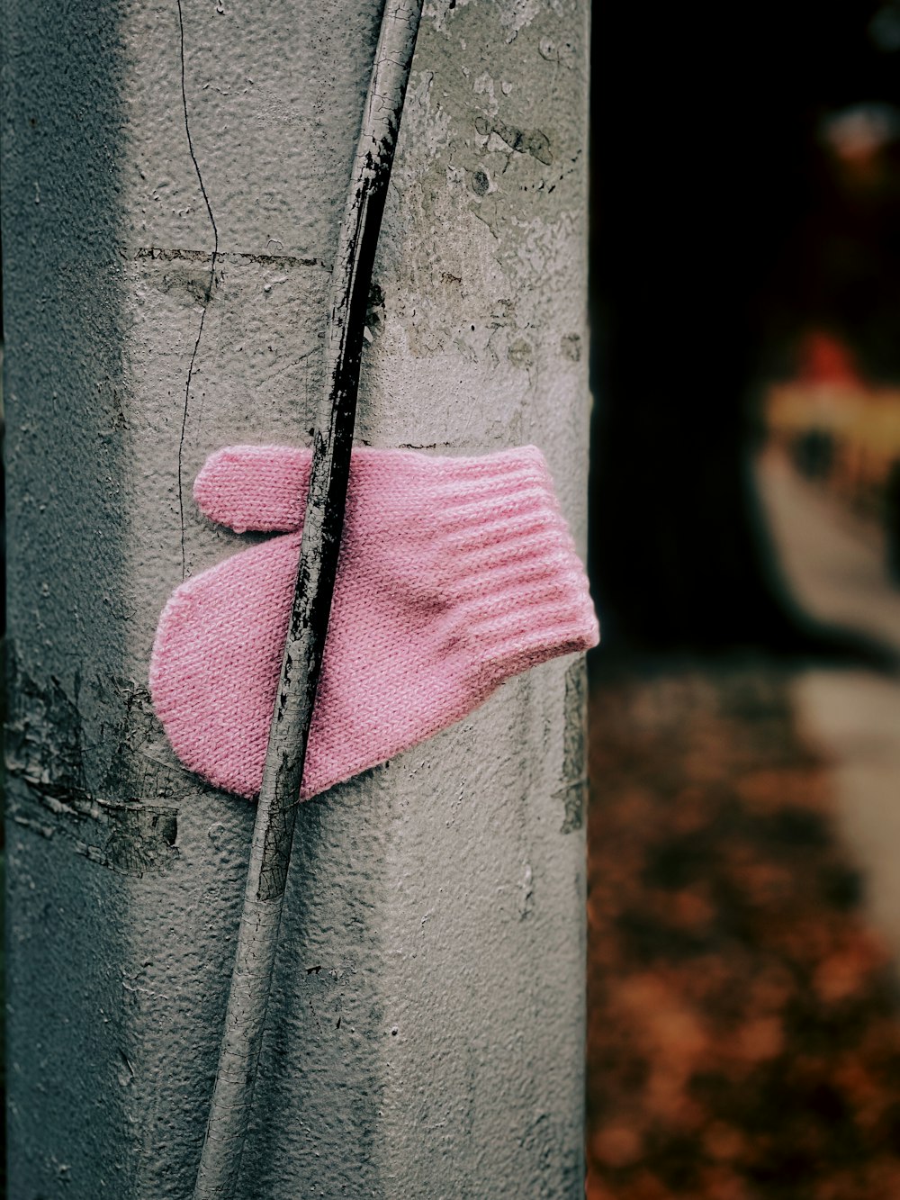 pink mitten on wall