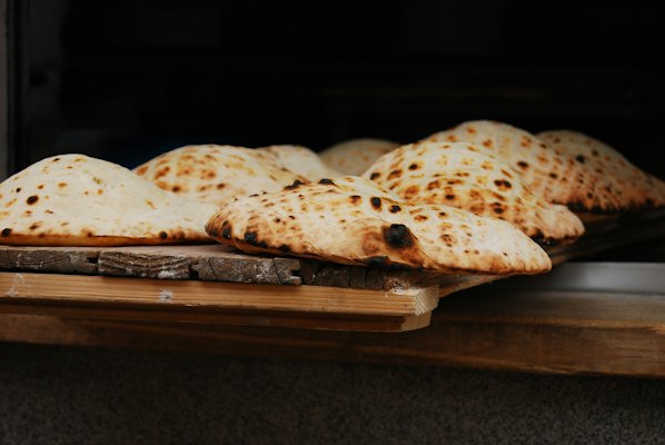 Tray of food on wooden surface — Sarajevo, Bosnia and Herzegovina