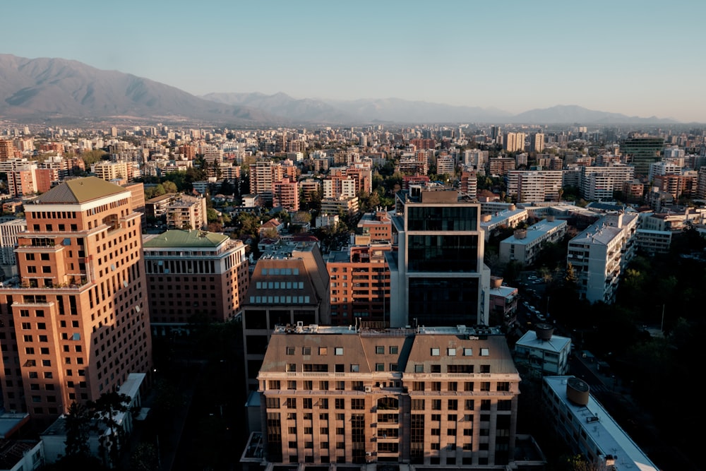 an aerial view of a city with tall buildings