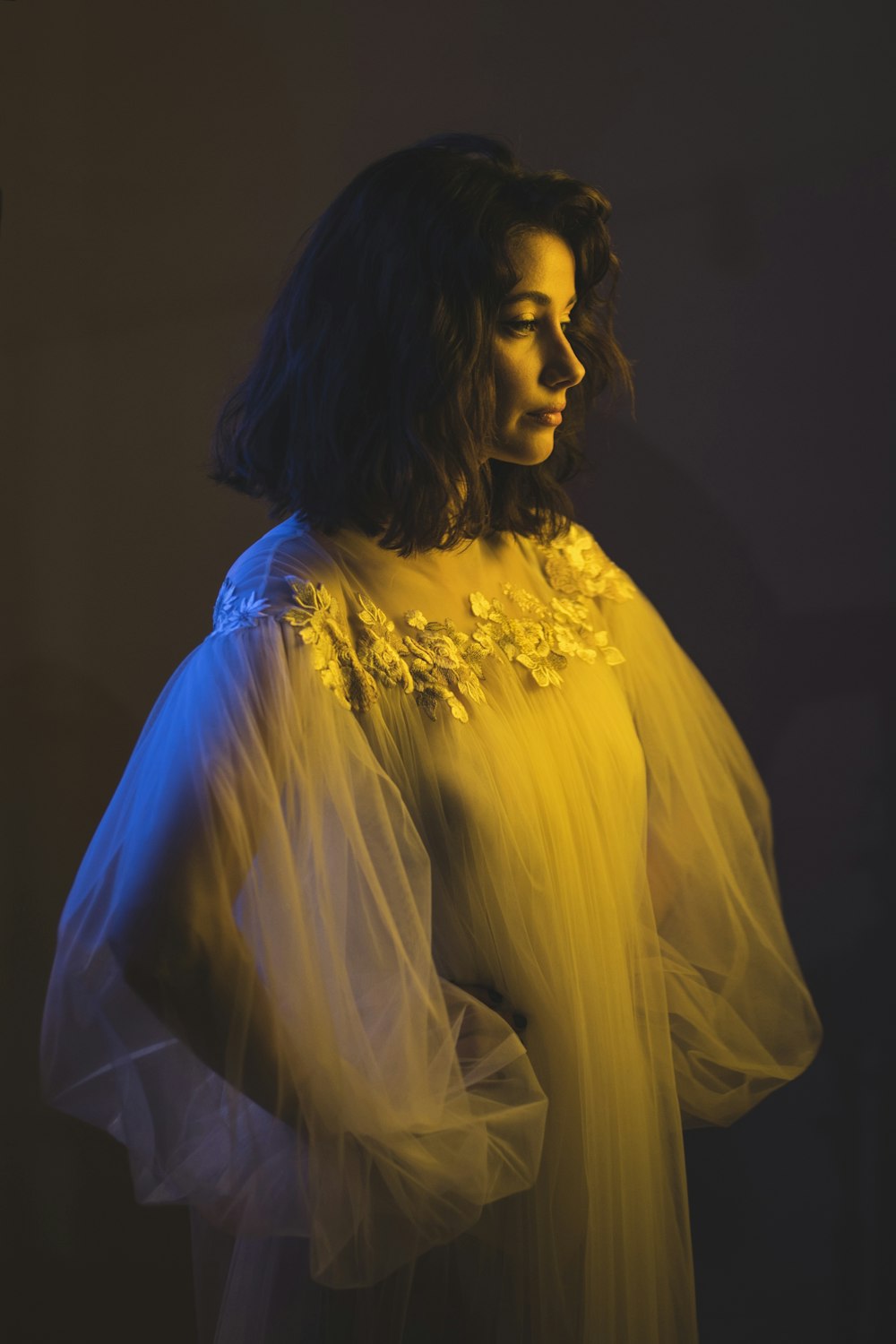 woman in white long-sleeved dress