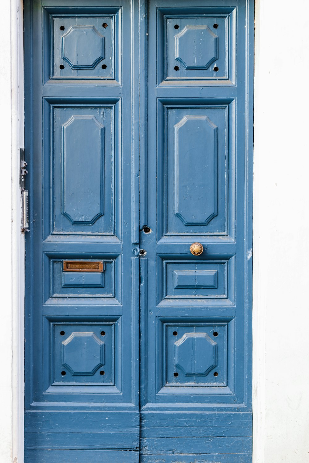 brown wooden paneled doors