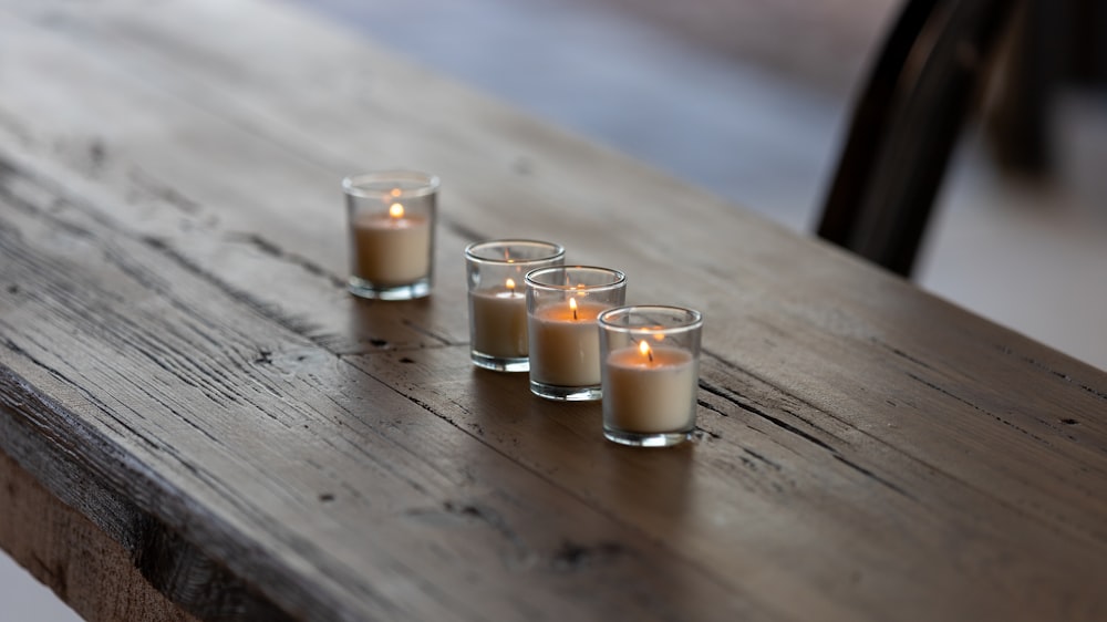 four votive candles