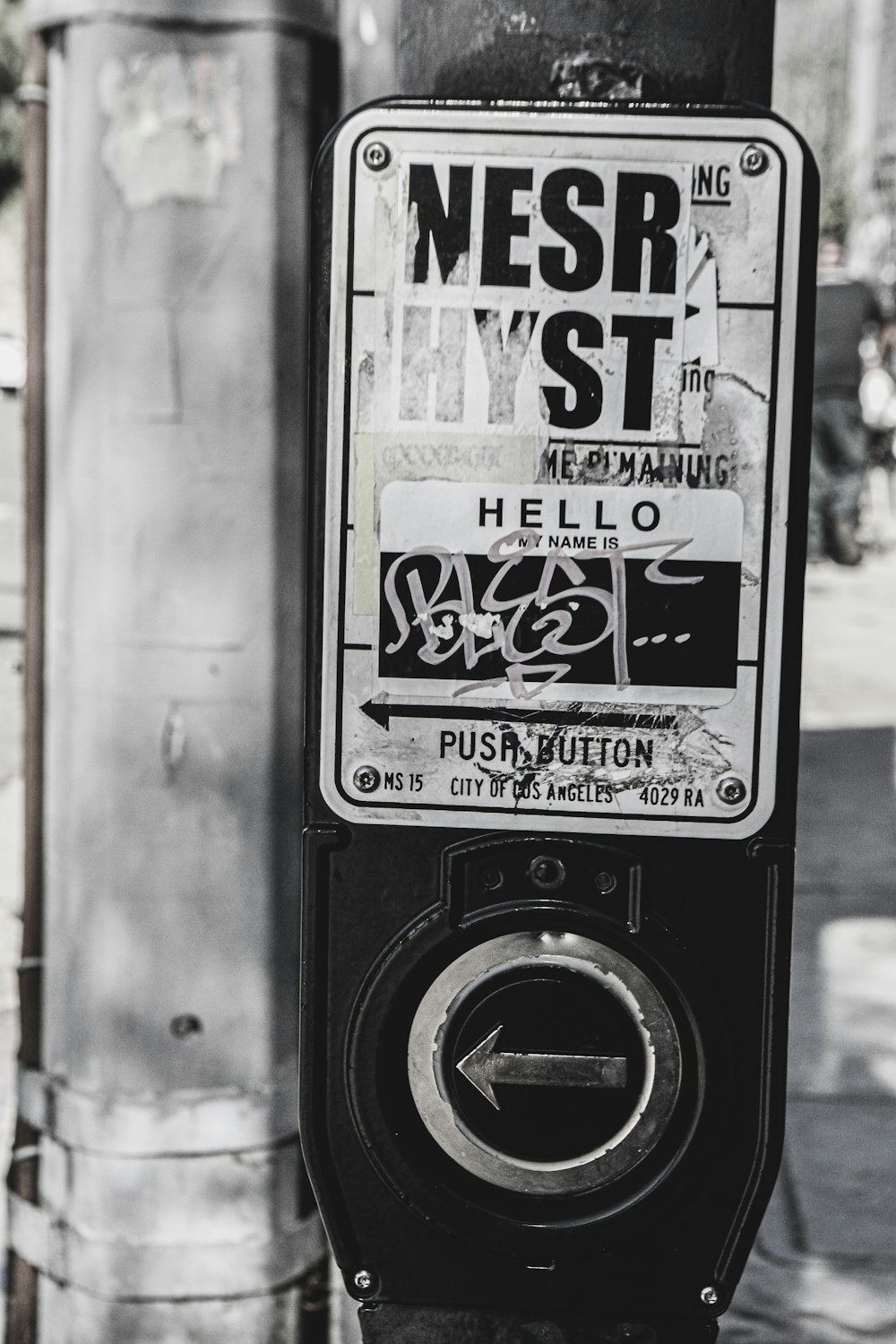 a black and white photo of a parking meter