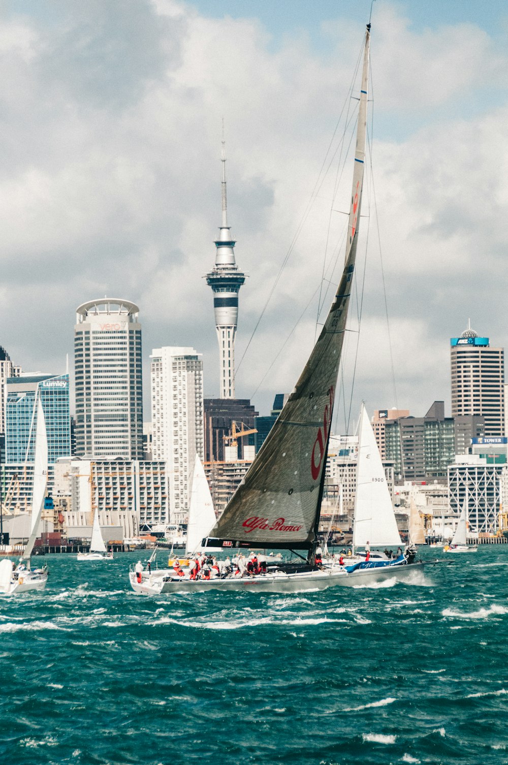 grey and white sailboat during daytime