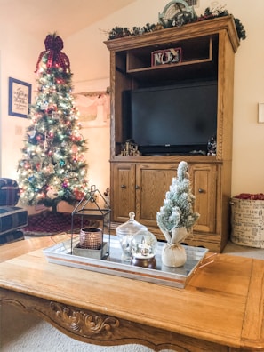 A cozy living room decorated for a holiday gathering with relatives.