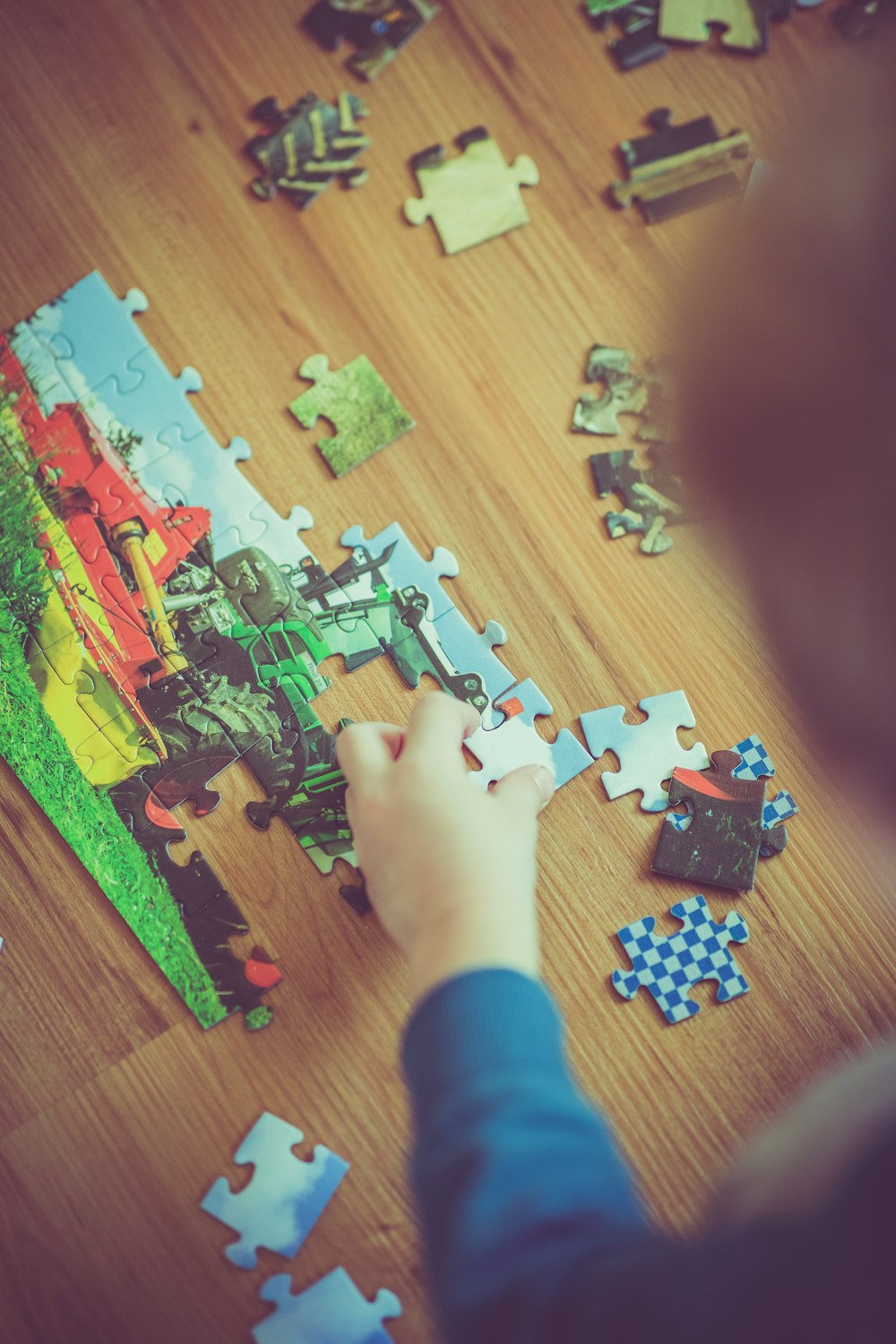boy playing puzzle