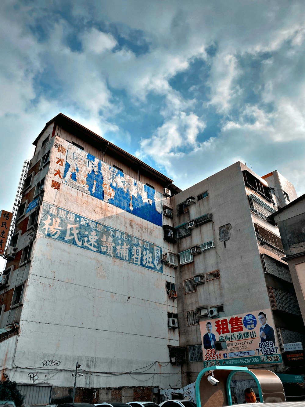 white and blue high-rise building