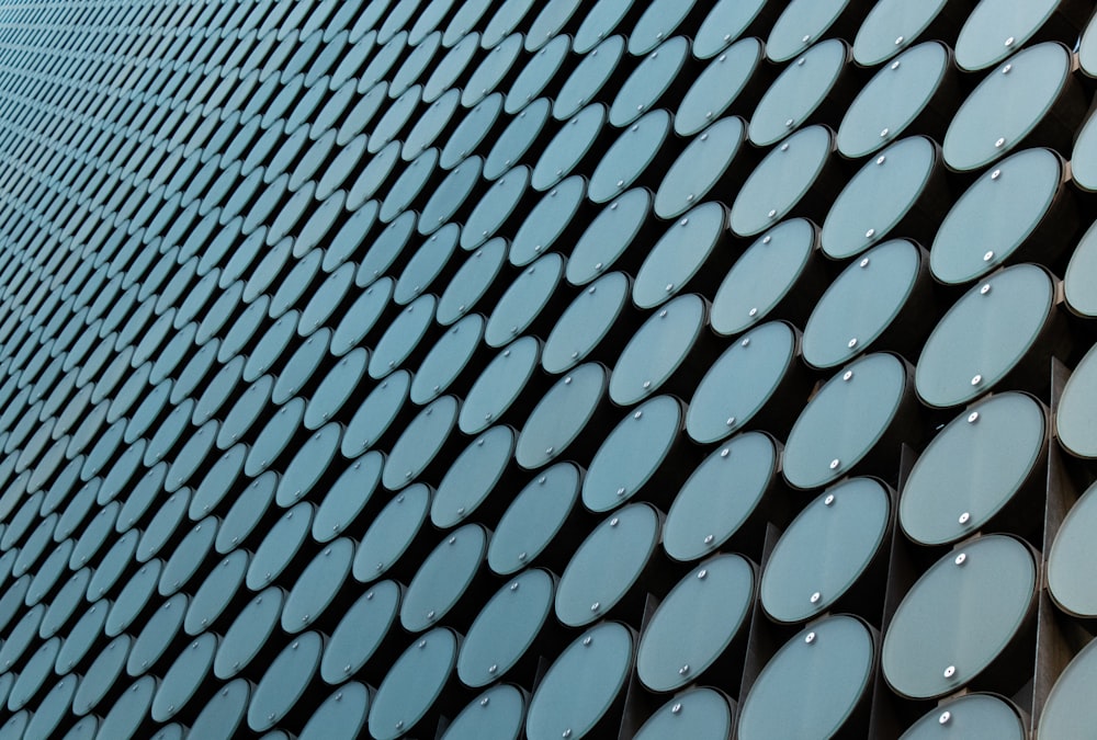 a close up of a wall made up of circles