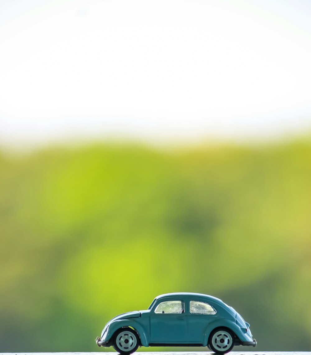 blue Volkswagen beetle toy