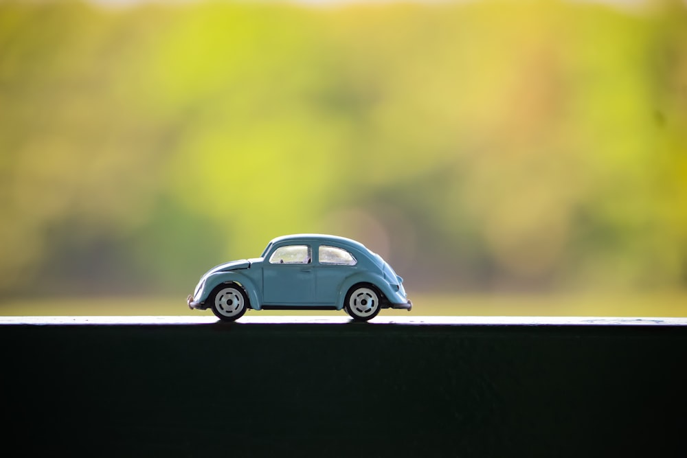 gray Volkswagen beetle toy