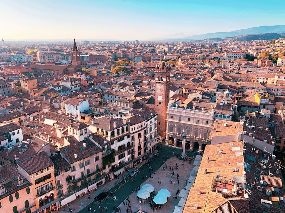 an aerial view of a city with tall buildings