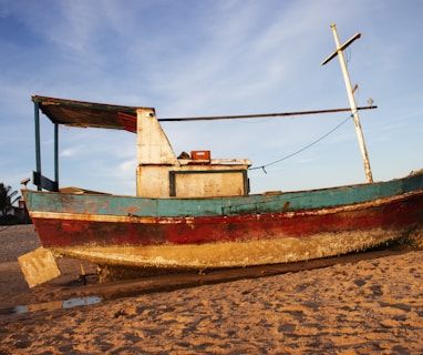 green and red wooden boat