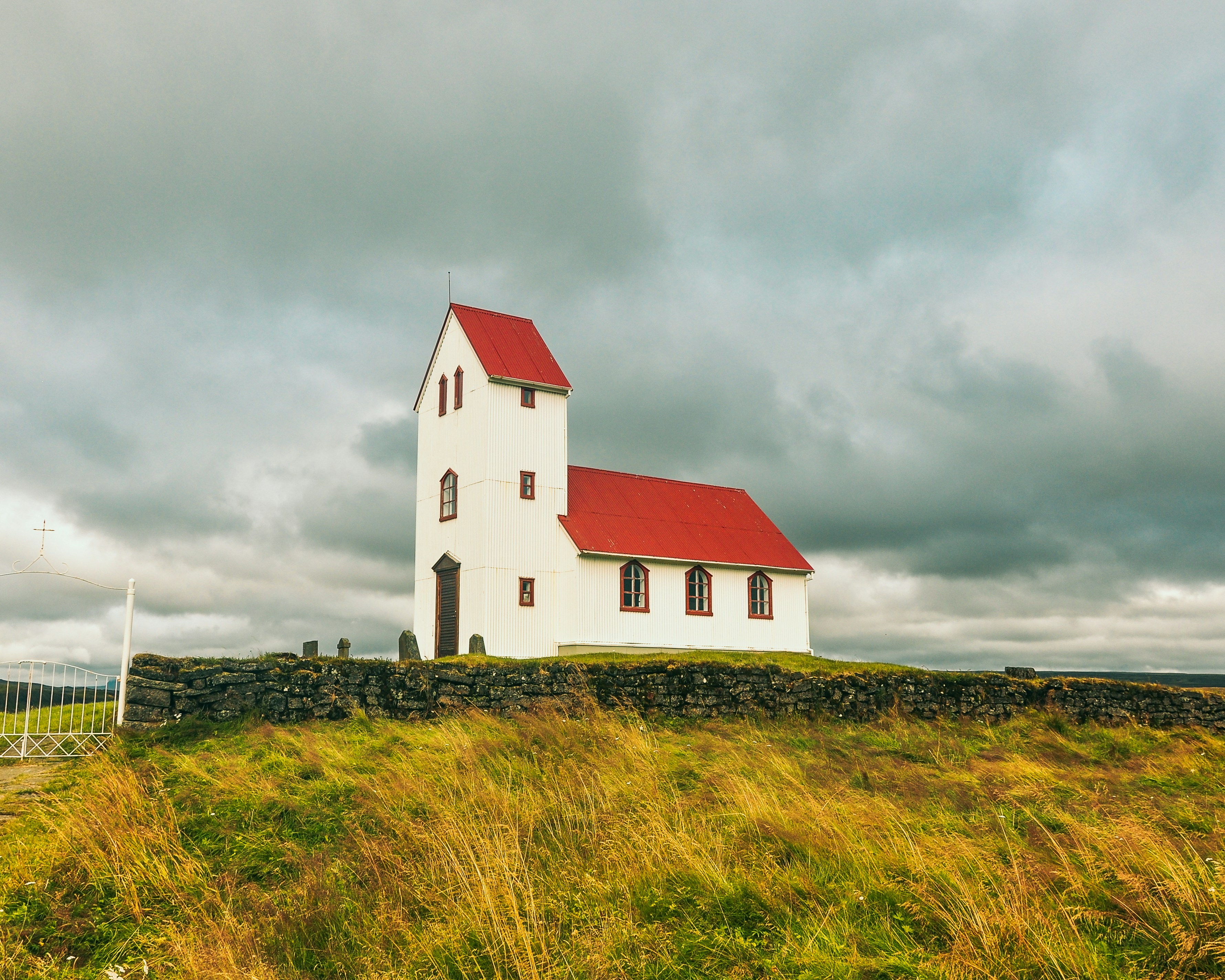 white and red concrete building during daytime