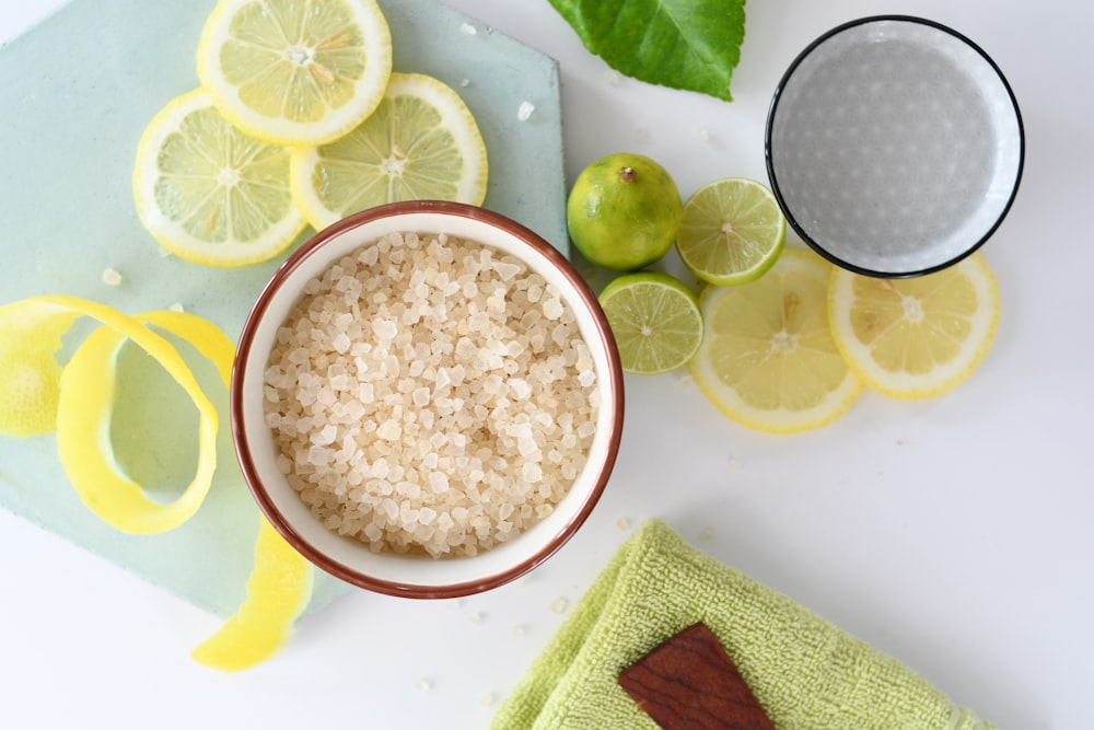 round white ceramic bowls beside sliced lemons