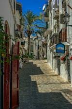 concrete road between buildings