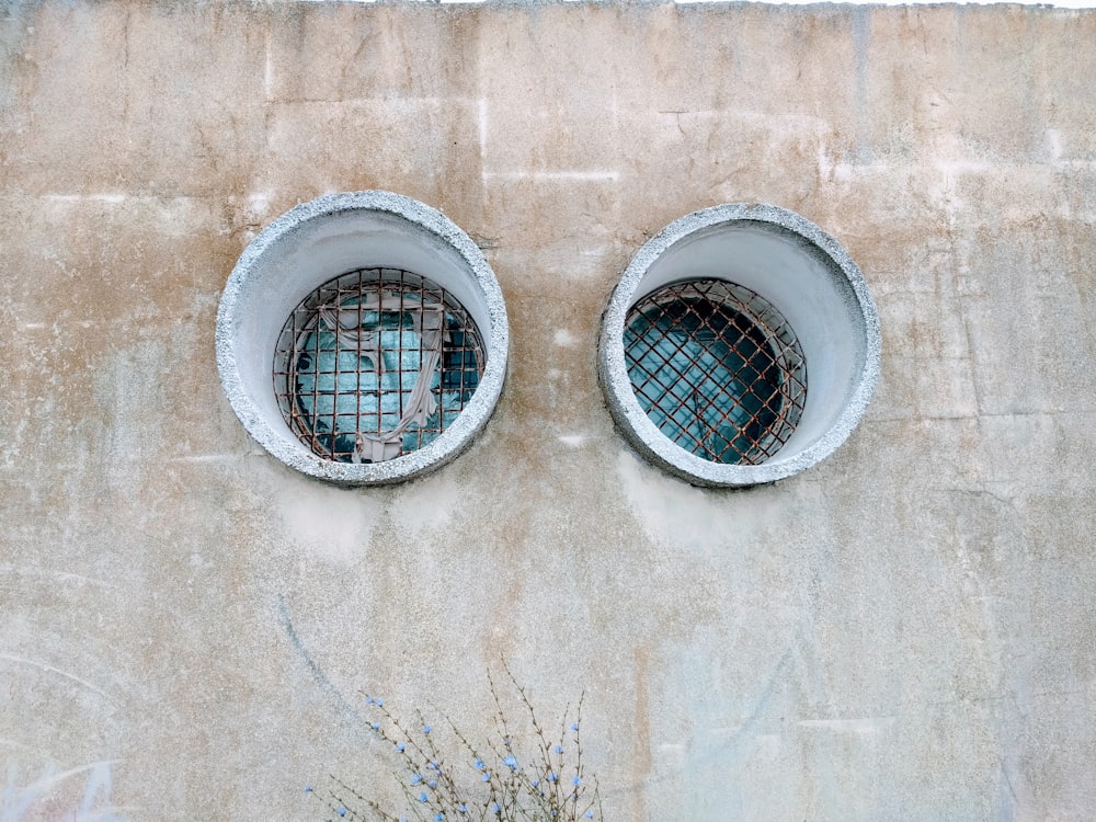 gray concrete building with two tunnel