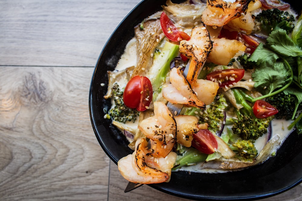 bowl of food on gray wooden surface