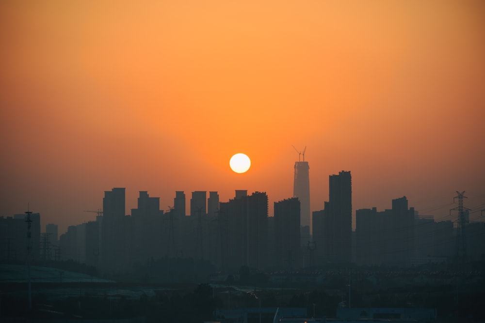 landscape photograph of city at sunset