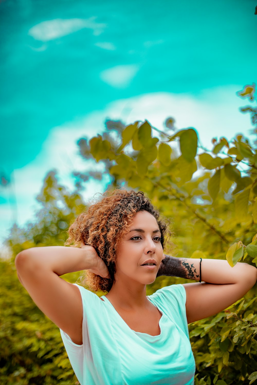 photo-shoot of woman touches her hair