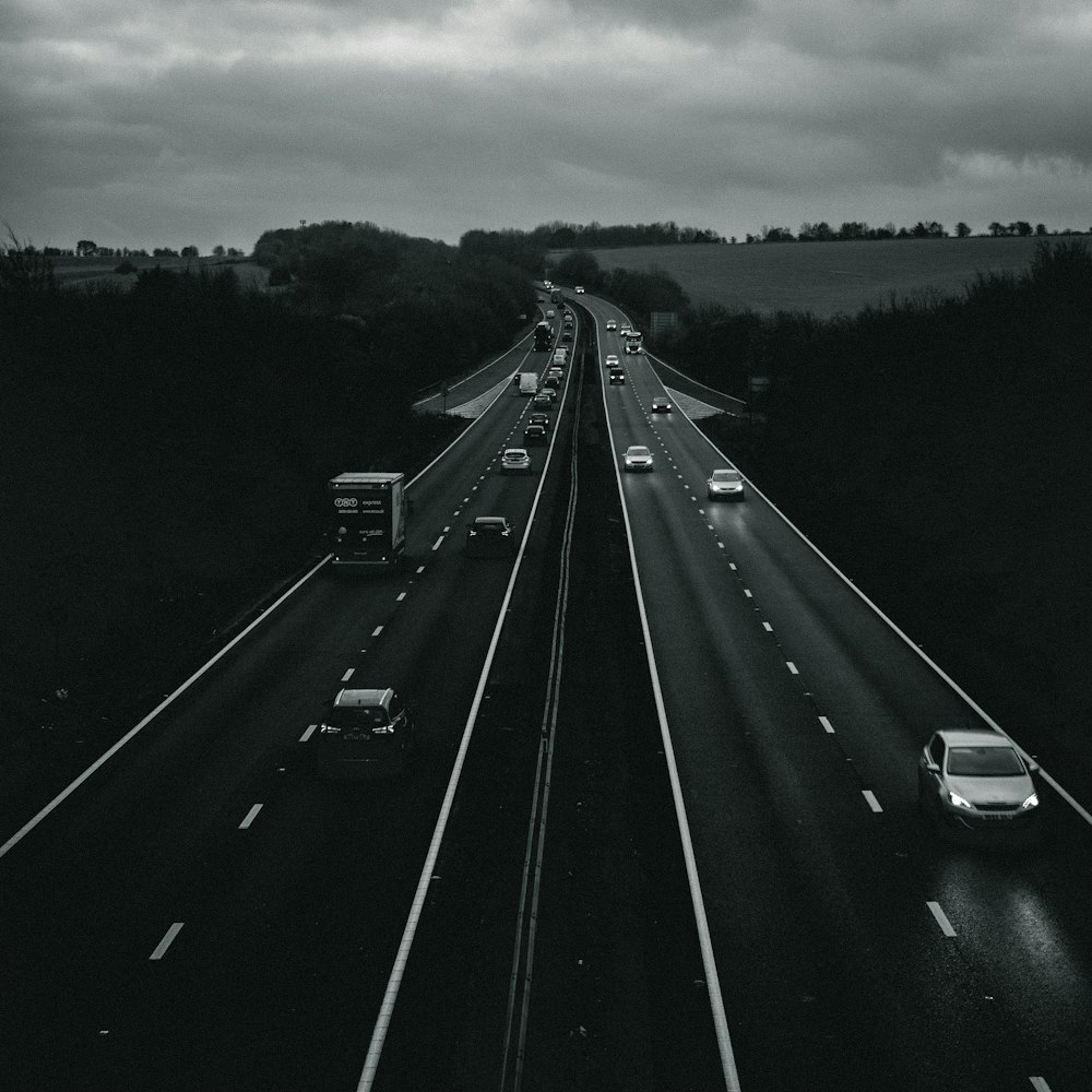 vehicles crossing on road with two lanes