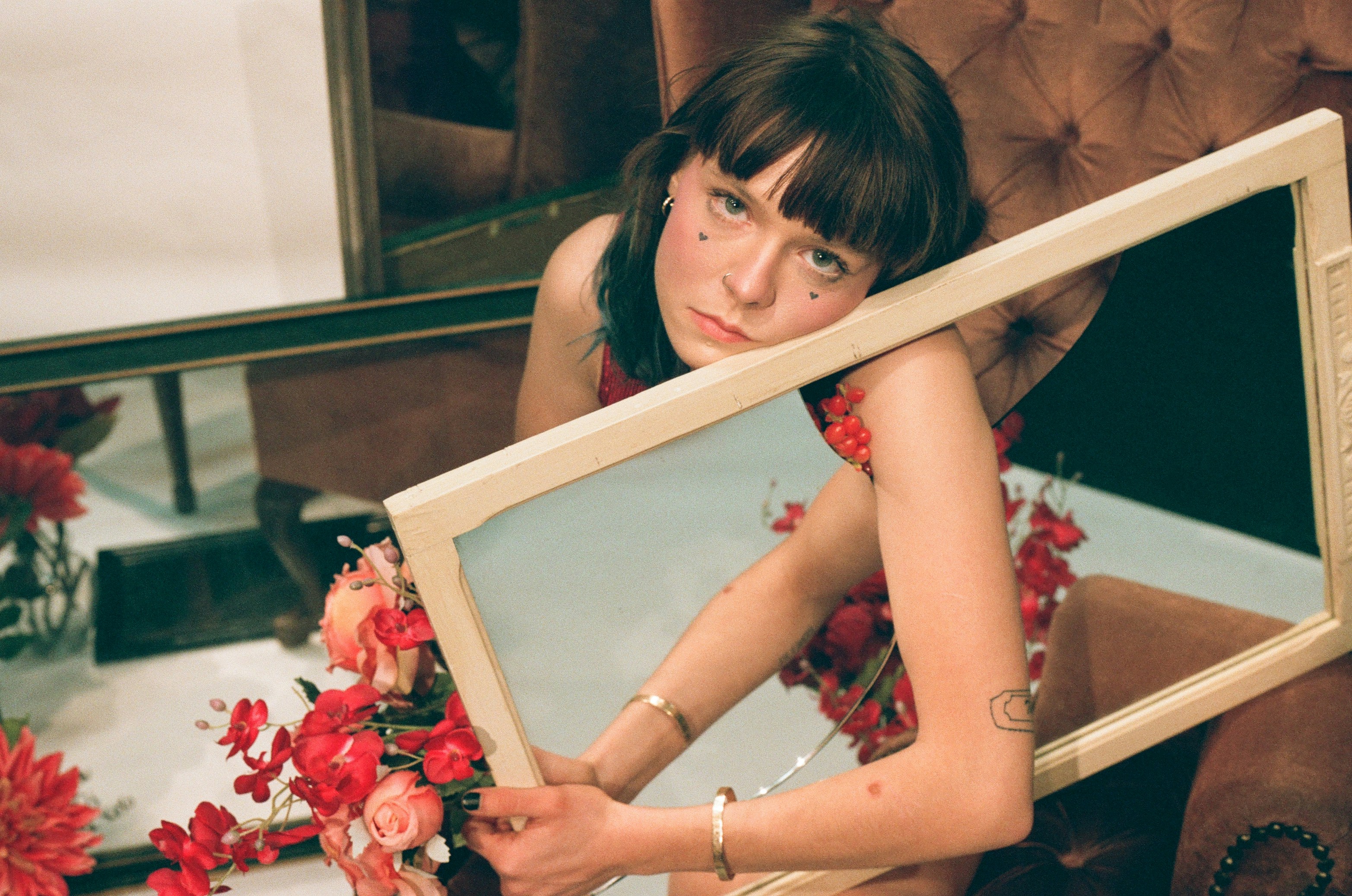 beige wooden framed mirror