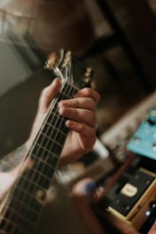 person playing guitar