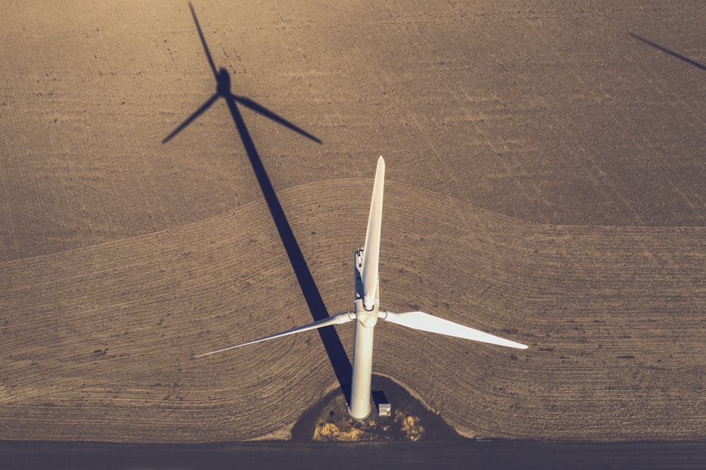 white windmill on steppe