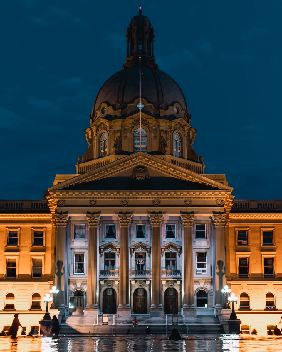 The Alberta Legislature Building in Edmonton lit up at dusk