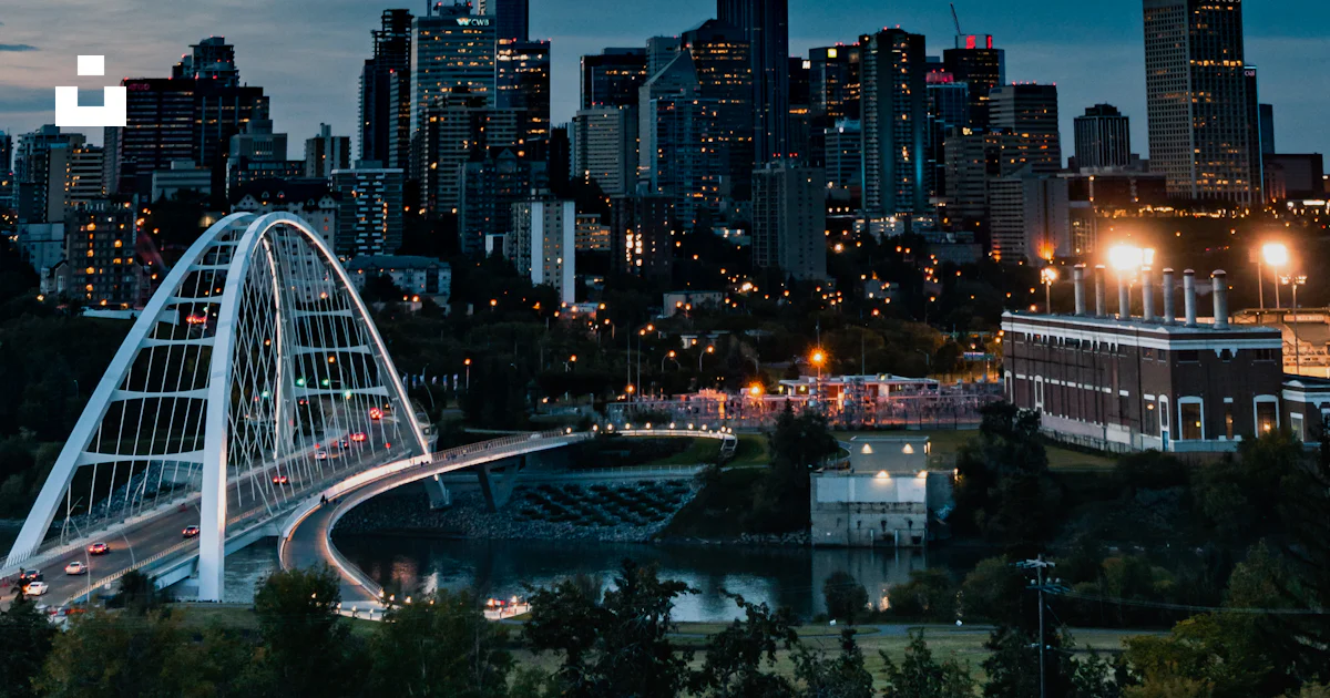 Edmonton High Rise Aerial photography of city with high-rise buildings under blue and ...